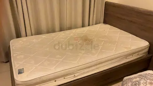 Double bed frame with used mattress - wooden headboard