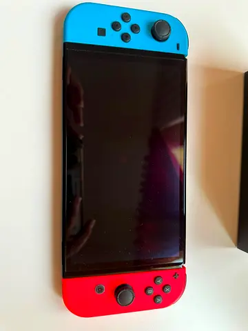 Nintendo Switch with accessories and GTA game