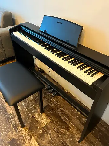 Casio PX-770BK Digital Piano with bench and Headphones.
