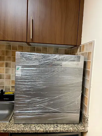 Compact stainless steel countertop dishwasher — good condition
