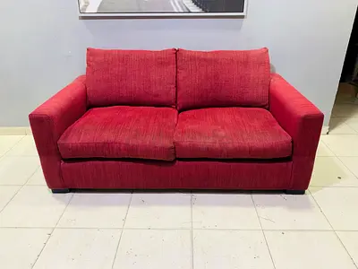 Red 2-seater Fabric Sofa come bed in Good Condition