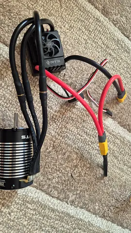 RTS 4268 2150kv Brushless Motor, ESC 150Amp 6S Combo and a program card for RC vehicle.