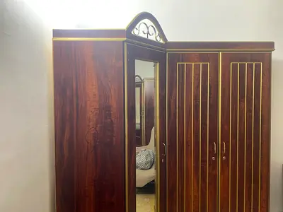 Large Wooden Wardrobe with mirror and Decorative Top