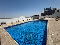 Al Majaz 3, 2 bedrooms and a living room, 3 bathrooms, a master maid's room, free gym and swimming p