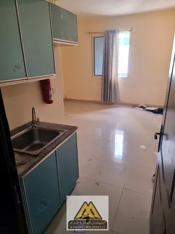 A spacious studio with excellent split AC, conveniently located near Ajman University and Ajman Court, available exclusively with 4 cheques.