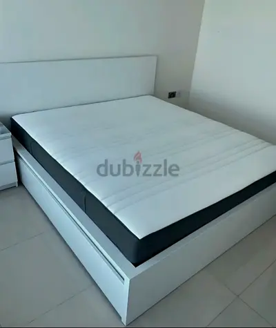 Ikea king size bed with mattress and storage drawers
