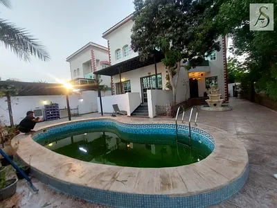 Swimming pool/ Spacious 5 bedroom double story villa / close to heera beach al riffah area