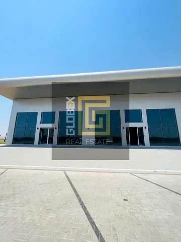 Brand New 6,500 SQFT Ground Floor Showroom for Rent in Al Bahia, Spacious Parking, Near Al Zahya, Al Amerah and Al Raqaib
