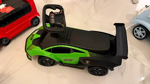 Green Lamborghini-style Ride-On Push Car for Toddlers (Good Condition)