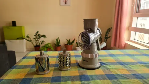 Compact Manual Rotary Vegetable Slicer/Grater with 3 Drum Blades