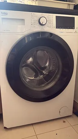 Beko front load washing machine - 8kg, not working condition no drum roll