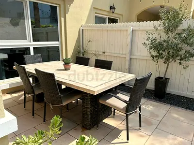 Rustic Outdoor Stone top and wicker Dining set, 6 wicker chairs