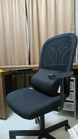 IKEA black office chair with hand rest and mesh back — excellent condition