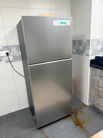 Used stainless steel double-door refrigerator - good condition