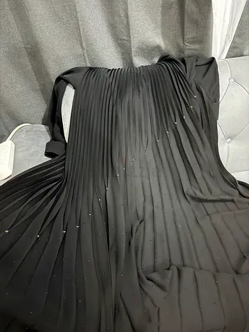 Black pleated long abaya with subtle embellishments - oversized
