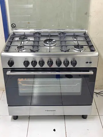 Bompani full gas cooker 90 by 60 cm like new condition