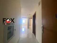 Two-bedroom apartment with a living room available for annual rent in Al Jurf 3, Ajman. Features inc