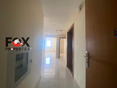 Two-bedroom apartment with a living room available for annual rent in Al Jurf 3, Ajman. Features include 2 bathrooms and a balcony. Price: 35,000 AED