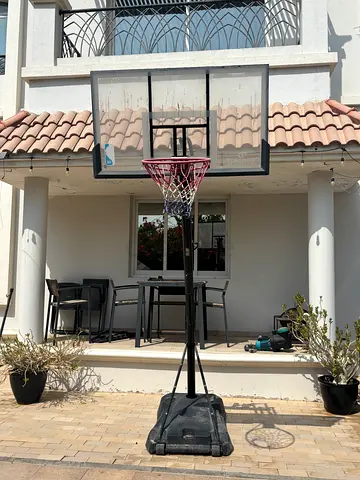 Adjustable portable Spalding basketball hoop with base
