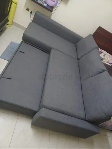 Grey L-shaped Sofa Bed - Good Condition