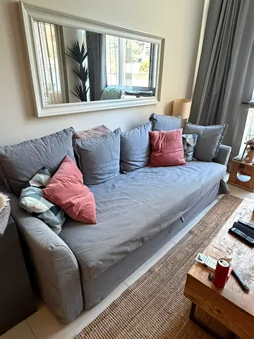 Gray 3-seater IKEA Sofa bed with Cover and Cushions - Good Condition