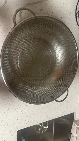 Large stainless steel colander/strainer with handles