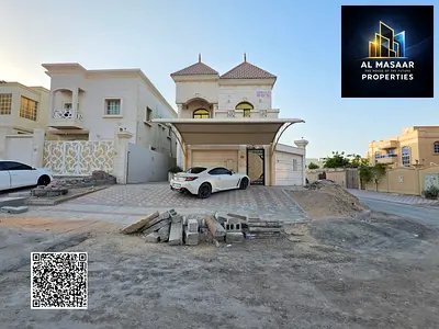 Includes electricity, water, and air conditioning. Corner lot with two street frontages. Central air conditioning. Located in Ajman. Freehold.