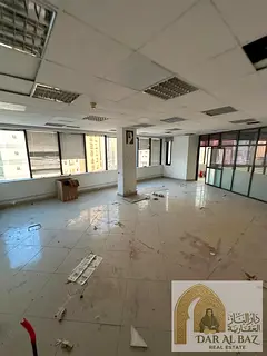 A spacious, excellent office available for annual rent in the Al Majaz 1 area of ​​Sharjah; feat