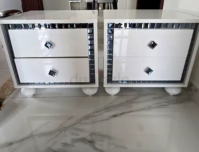 Pair of white mirrored bedside tables / nightstands with two drawers