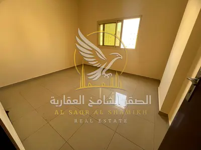 One Bedroom Apartment for Annual Rent in Al Butina Sharjah Spacious Layout Open View Two Bathrooms Large Kitchen Central AC Gas 6 Payments Deferred