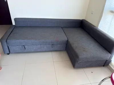 Gray L-shaped fabric sofa with storage, good condition - IKEA