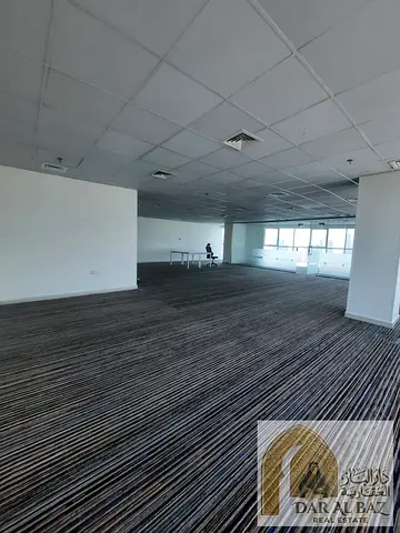 Luxury office for annual rent in Al Majaz 2 | 2,000 sq. ft. | Sea view | Chiller Free | Free parking | Kitchen and bathroom