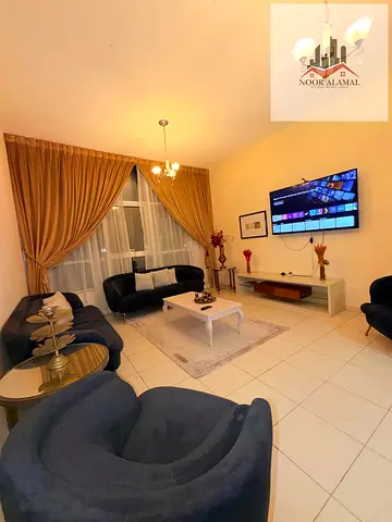 Sharjah, Al Nakhla Tower 1: Apartment featuring a bedroom, living room, kitchen, and two bathrooms.
