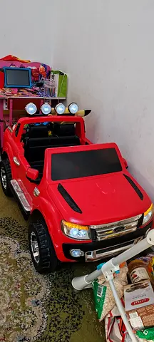 Red Electric Ride-On Toy Car for Kids (2-Seater, Battery Powered)