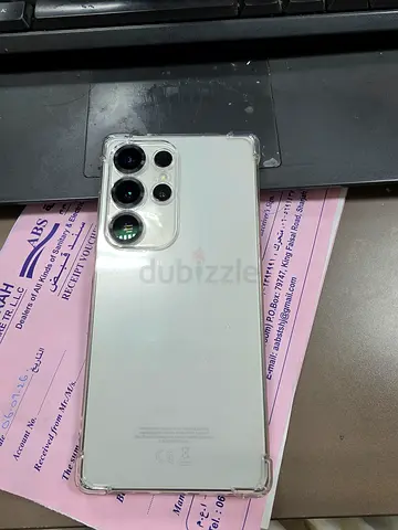 White Samsung S25 ultra smartphone with quad rear cameras - good condition