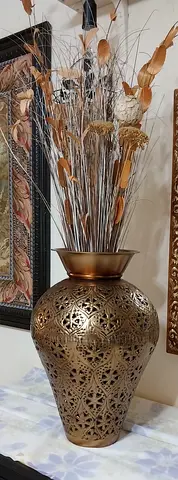 Big Metal vase with dry leaves