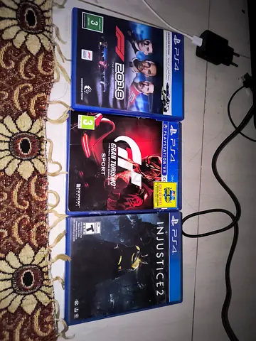 Bundle of 3 PS4 Games - F1 2018, Injustice 2, Gran Turismo Sport spilit screen multiplayer