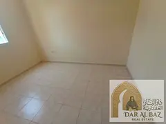 For annual rent in Al Qulay'ah, Sharjah: • 2 bedrooms and a living room • 2 bathrooms • Centra