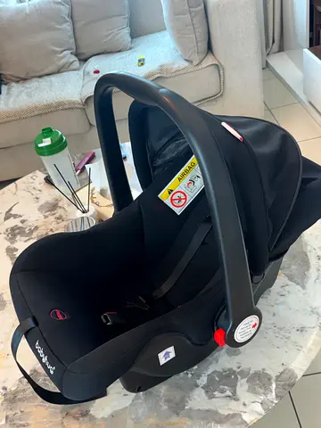 Used black infant car seat (rear-facing) with carry handle