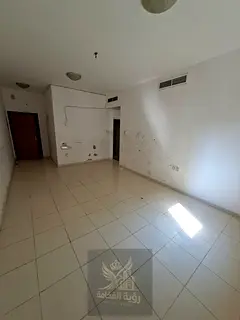 One bedroom apartment for rent in Al Butina Sharjah, spacious with balcony, bathroom and central AC.