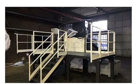 Used Industrial cutting and Milling Machine on Raised Platform with Safety Rails and dust collection