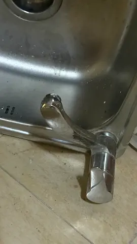 Used stainless steel kitchen sink with single lever faucet