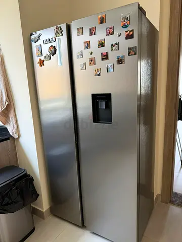 Silver Side-by-Side Refrigerator with Water Dispenser - Good Condition