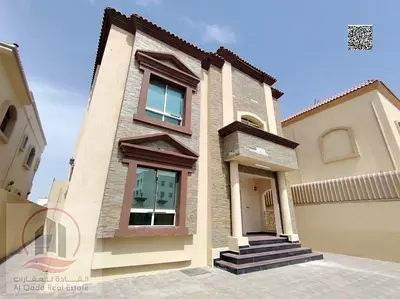 Villa for sale in Al Rawda, Ajman: 7 master bedrooms, a rooftop terrace, a majlis, a living area, a