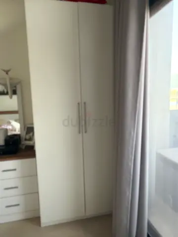 White 2-door wardrobe / armoire in good condition