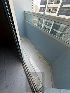 For rent in Al Majaz 2, one bedroom and living room with balcony and 2 bathrooms. Free parking and f