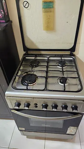 Used 4-Burner Gas Stove with Oven - Good Working Condition
