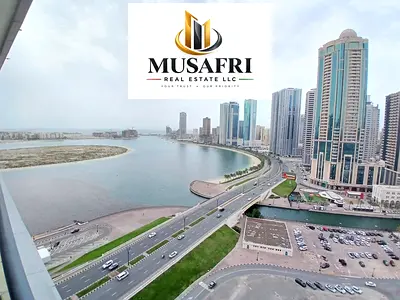 CHILLER AC FREE//HUGE 2BHK APARTMENT//WITH WATER VIEW//WITH BALCONY & GYM POOL FREE//FAMILY BUILDING//LIVE LIFE//PRIME LOCATION//EASY EXIT TO DUBAI//