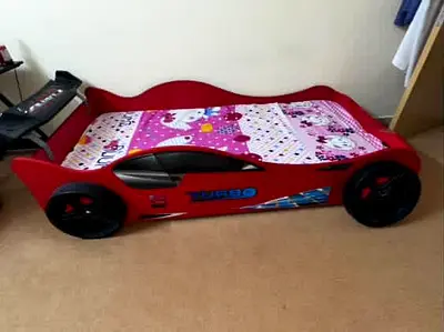 Negotiable Red Kids Race car bed. Good condition. Negotiable price urgent sale