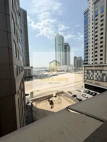 For rent in the Emirate of Sharjah, specifically in the Al Khan area: The apartment consists of two bedrooms and two bathrooms. The price is 43,000, p